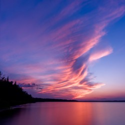 Fleeting clouds at sunset over Skeleton lake